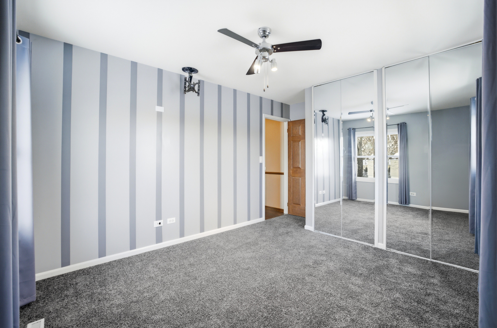 220 Dato Drive Streamwood, IL 60107 - Photo 30 of 36 a view of a hallway with wooden shelves