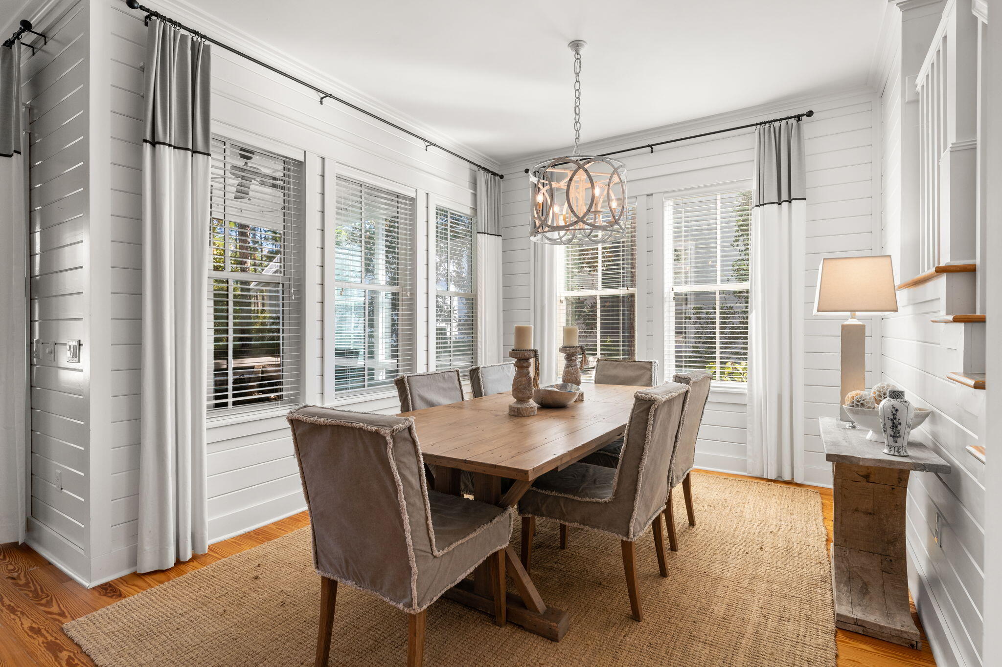 384 East Royal Fern Way Santa Rosa Beach, FL 32459 - Photo 14 of 63 a view of a dining room with furniture window and wooden floor