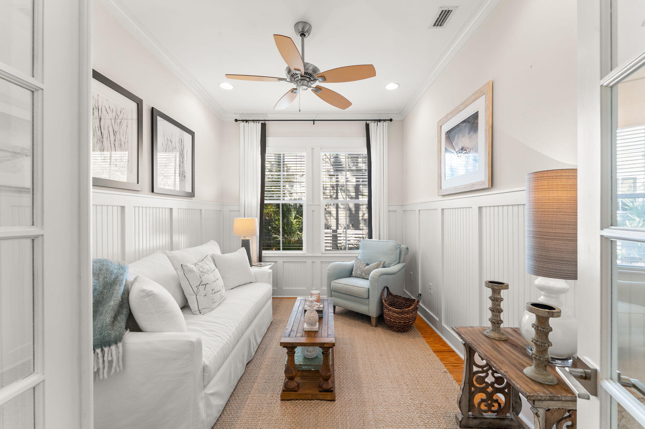 384 East Royal Fern Way Santa Rosa Beach, FL 32459 - Photo 16 of 63 a living room with furniture ceiling fan and a window