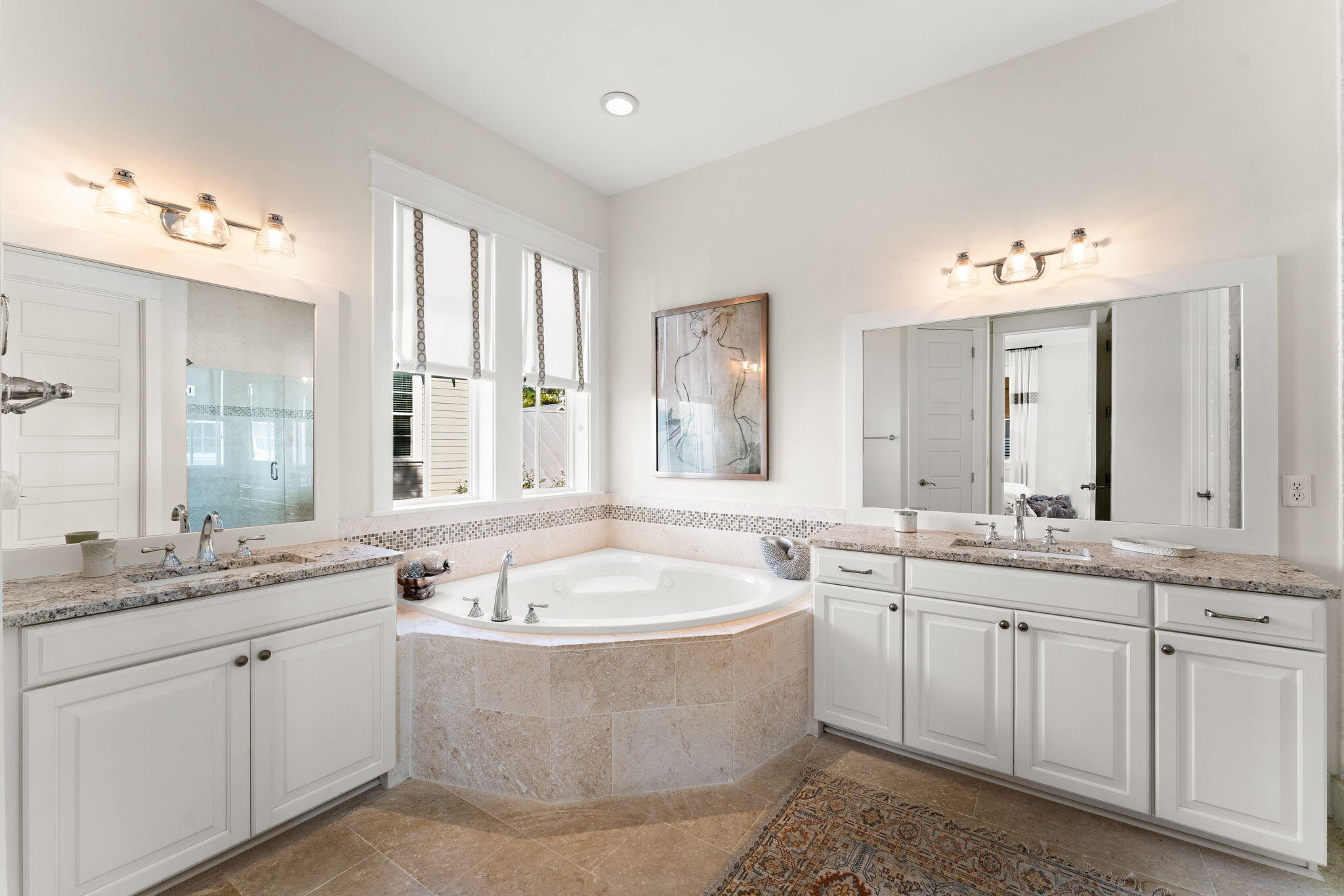 384 East Royal Fern Way Santa Rosa Beach, FL 32459 - Photo 37 of 63 a bathroom with a granite countertop double vanity sink a mirror and a bathtub