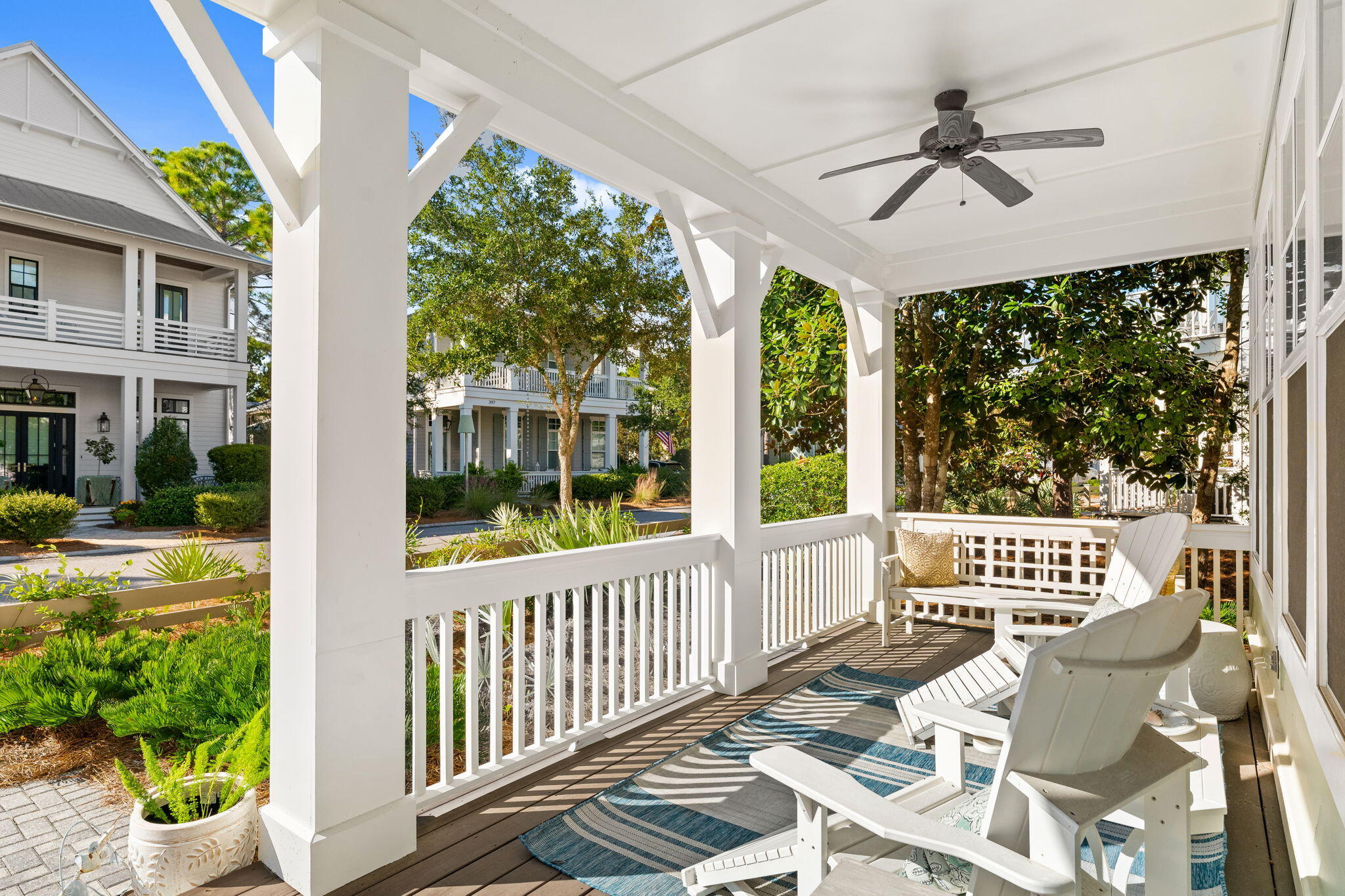 384 East Royal Fern Way Santa Rosa Beach, FL 32459 - Photo 5 of 63 a view of a porch with furniture and a yard