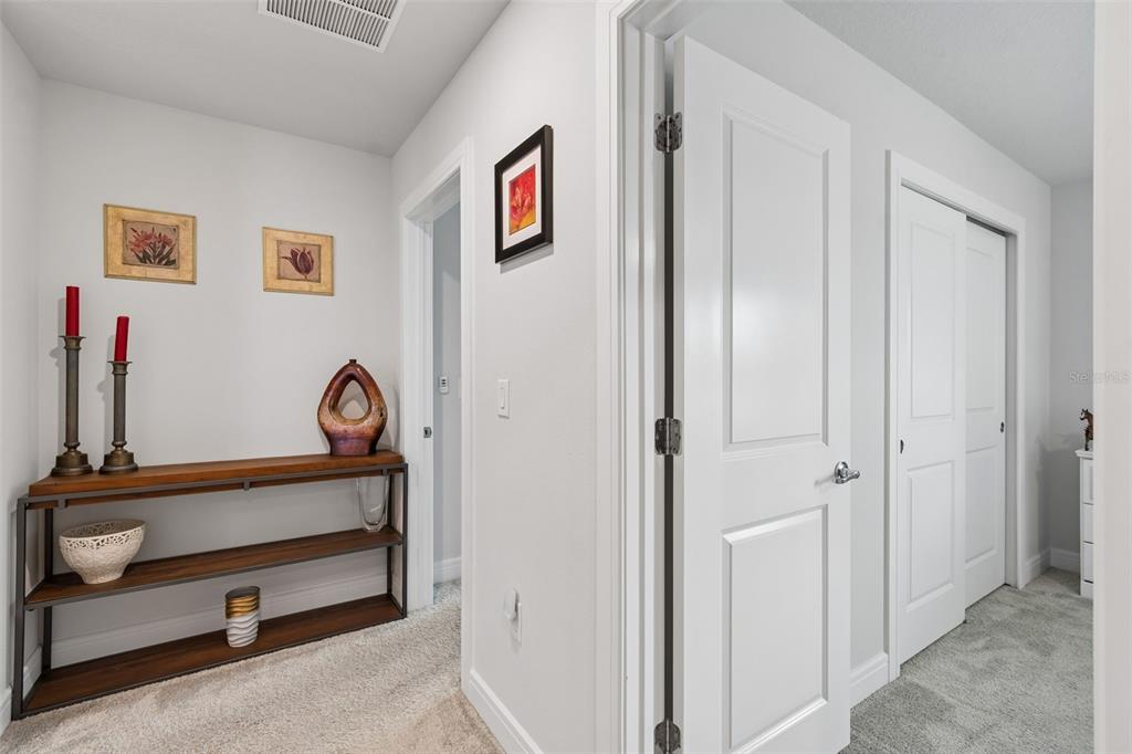 6608 Ryestone Way Wesley Chapel, FL 33545 - Photo 46 of 66 a view of a hallway with front door