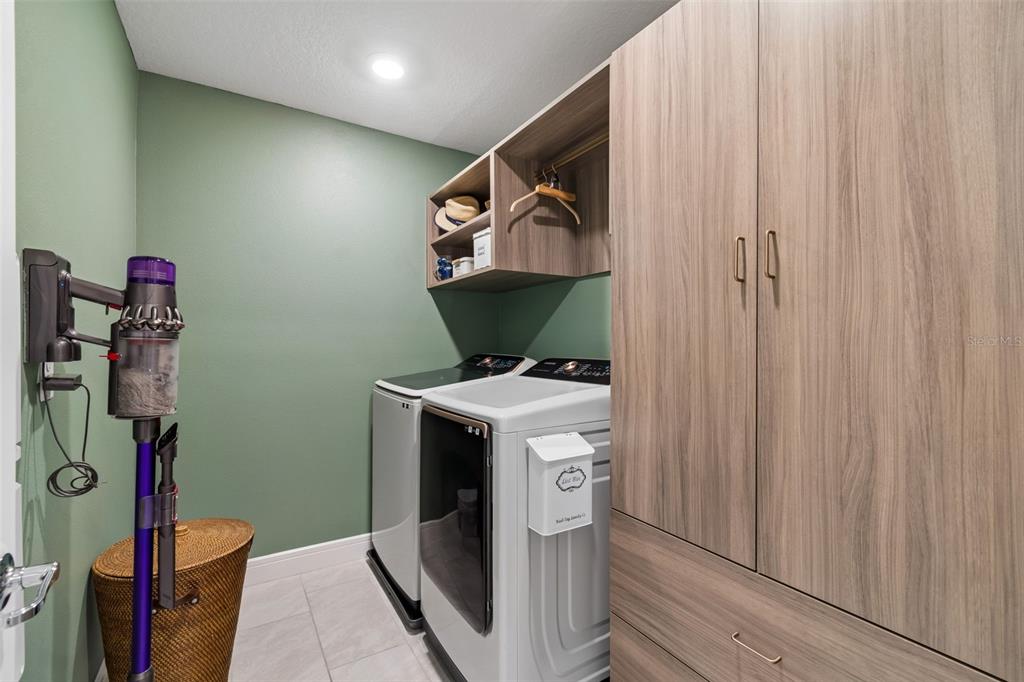 6608 Ryestone Way Wesley Chapel, FL 33545 - Photo 51 of 66 a utility room with dryer and washer
