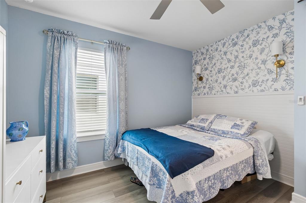 6608 Ryestone Way Wesley Chapel, FL 33545 - Photo 7 of 66 a bedroom with a bed and a window