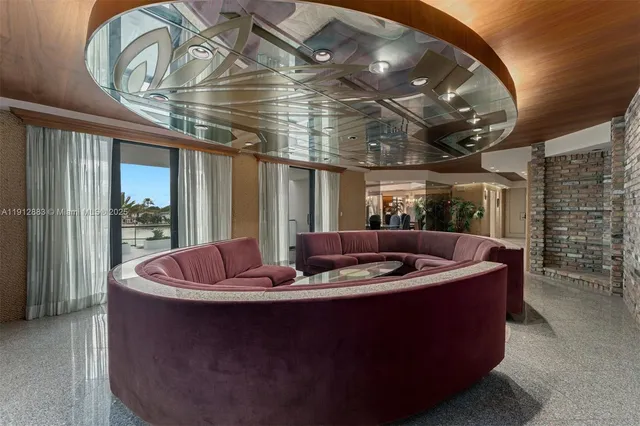 a view of a dining room with furniture wooden floor and chandelier