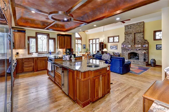 a living room with furniture gym equipment and a flat screen tv