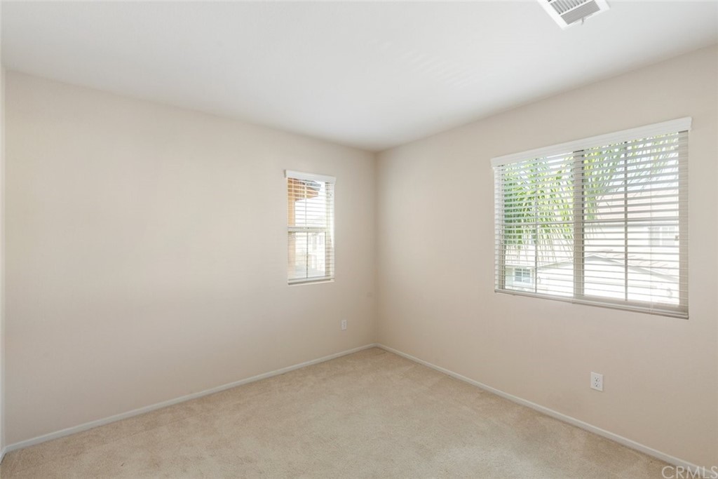 34159 Renton Drive Lake Elsinore, CA 92532 - Photo 20 of 35 an empty room with a window