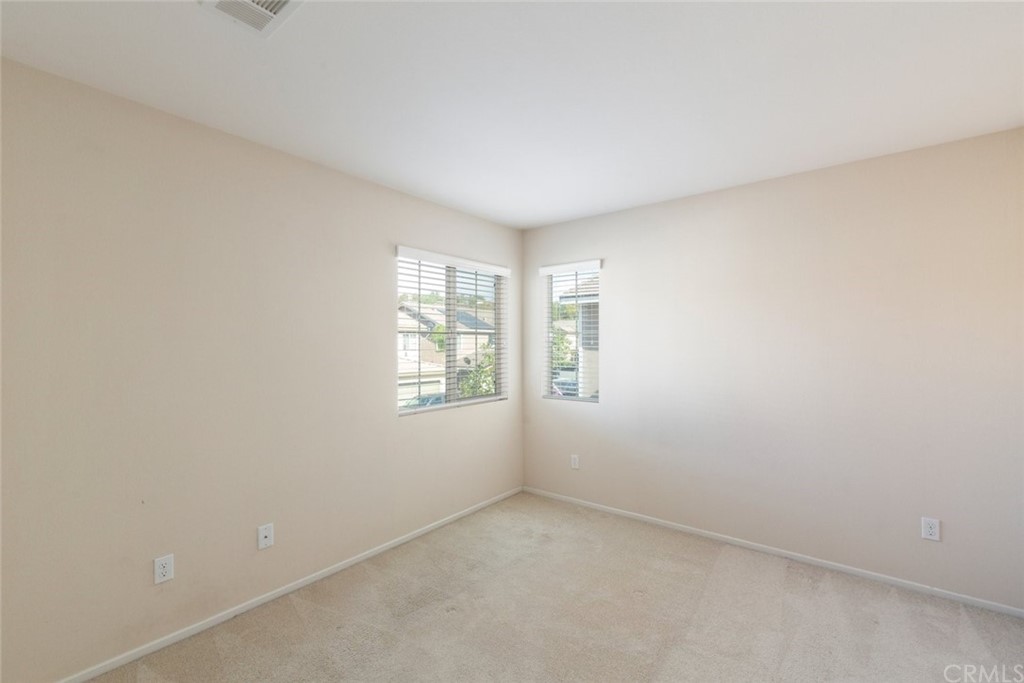 34159 Renton Drive Lake Elsinore, CA 92532 - Photo 22 of 35 an empty room with windows