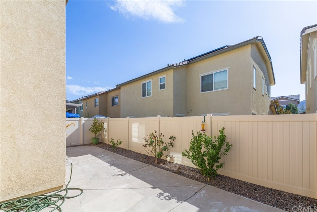 34159 Renton Drive Lake Elsinore, CA 92532 - Photo 23 of 35 a front view of a house with a yard