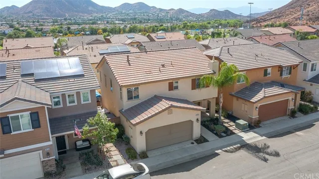 an aerial view of a house with a garden