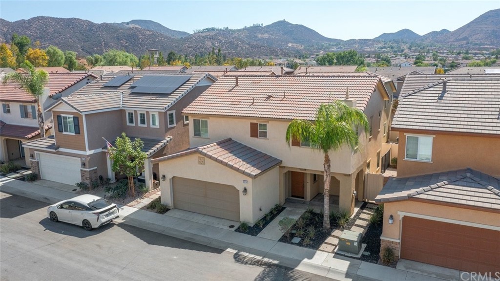34159 Renton Drive Lake Elsinore, CA 92532 - Photo 28 of 35 an aerial view of a house with a garden