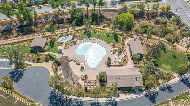 a view of a swimming pool with a lake view