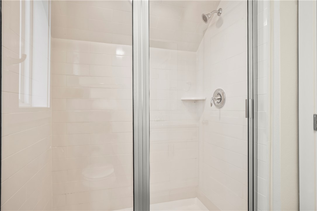 434 Oleander Street, Unit 2 Port Aransas, TX 78373 - Photo 11 of 40 a bathroom with a shower