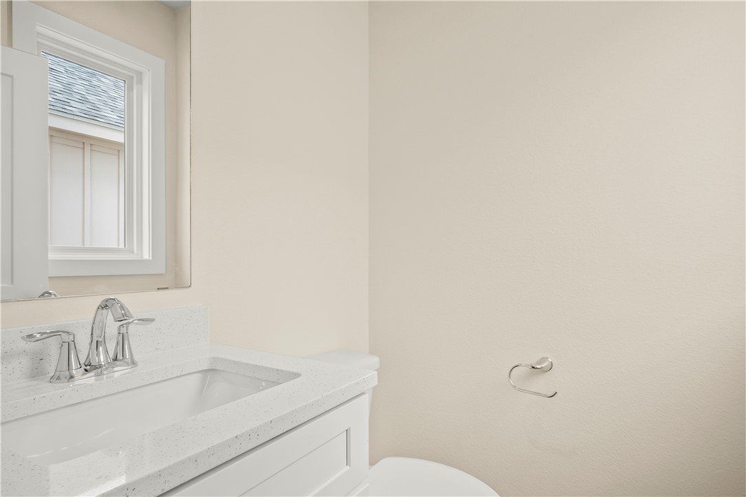 434 Oleander Street, Unit 2 Port Aransas, TX 78373 - Photo 28 of 40 a bathroom with a sink and a toilet