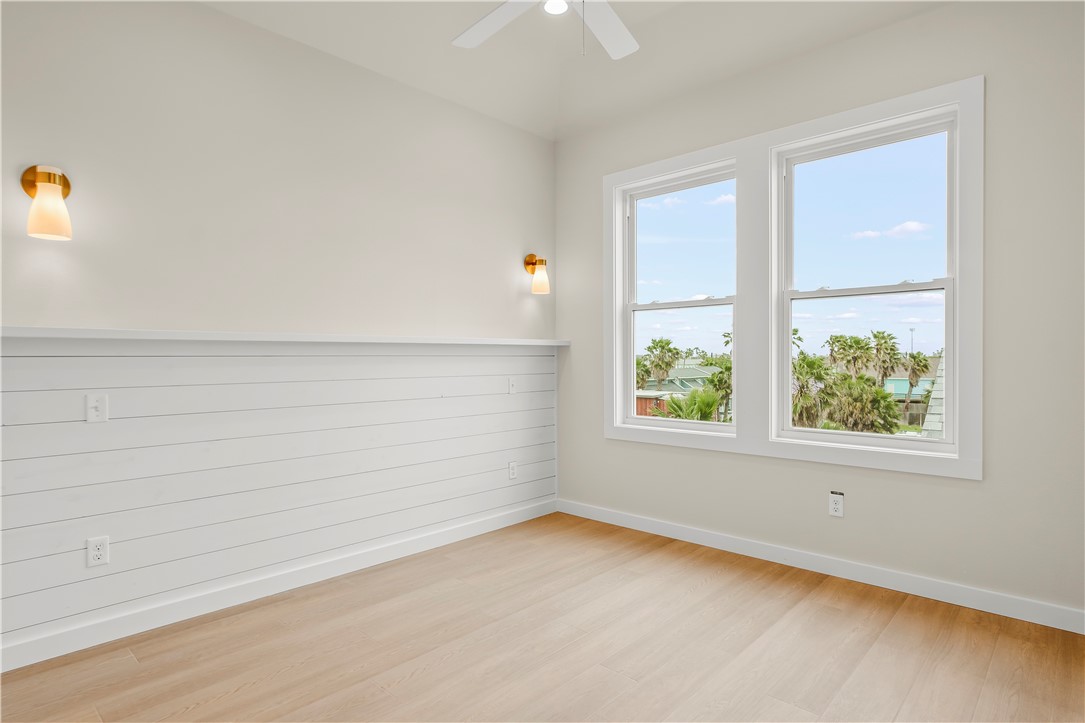 434 Oleander Street, Unit 2 Port Aransas, TX 78373 - Photo 34 of 40 an empty room with windows