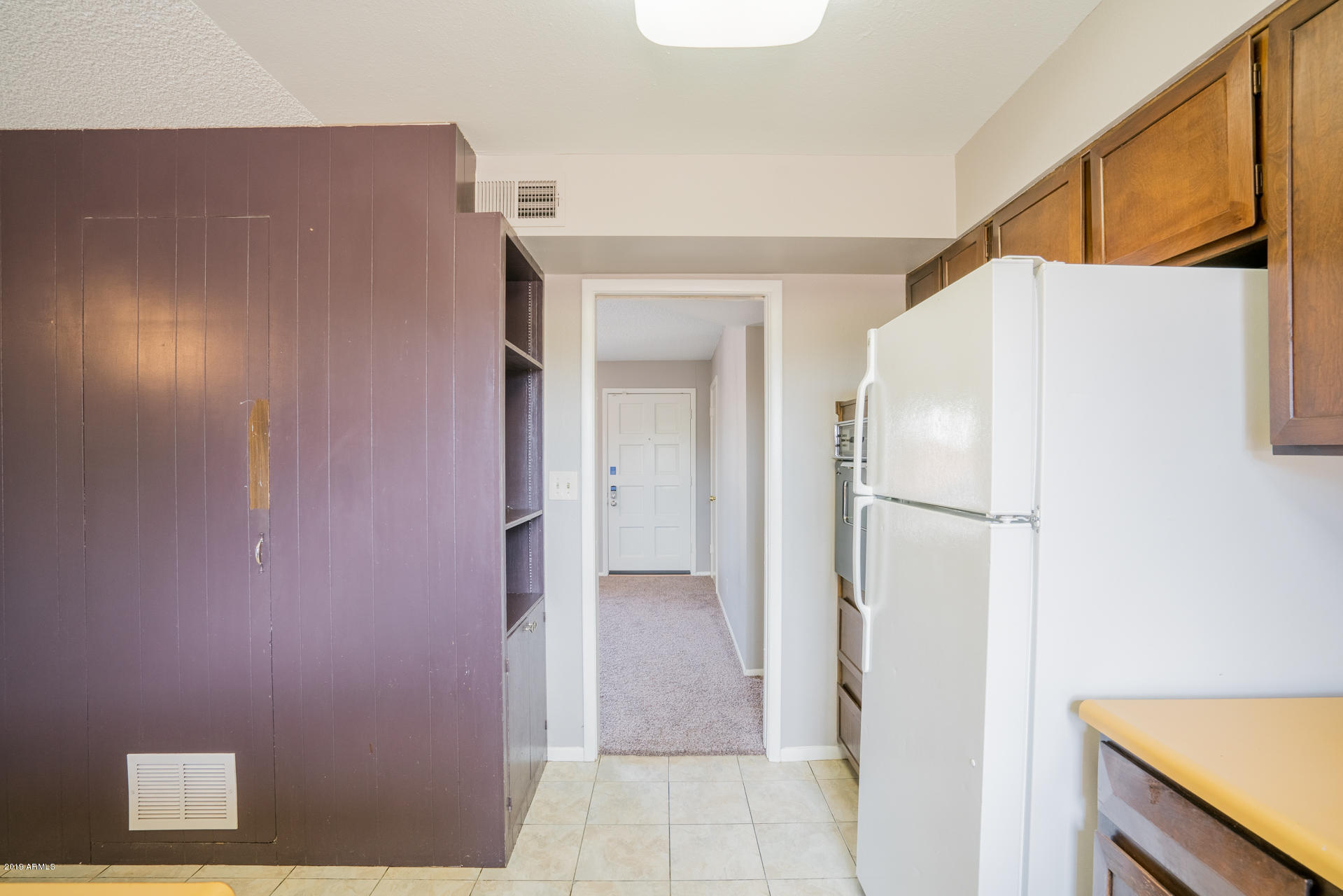 3845 West Hatcher Road Phoenix, AZ 85051 - Photo 6 of 19 a view of a room with a hallway
