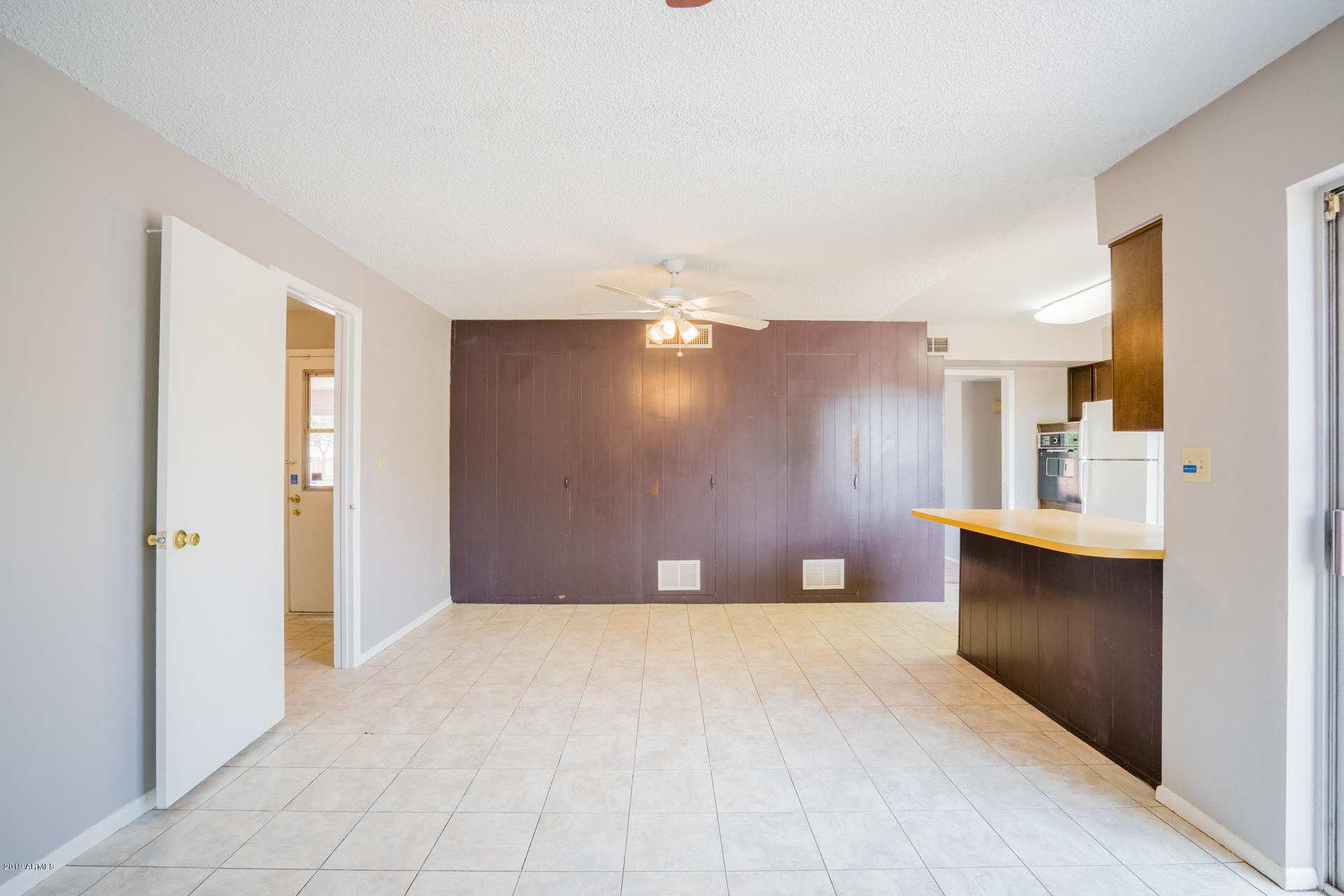 3845 West Hatcher Road Phoenix, AZ 85051 - Photo 8 of 19 a view of a kitchen with a sink and a large window