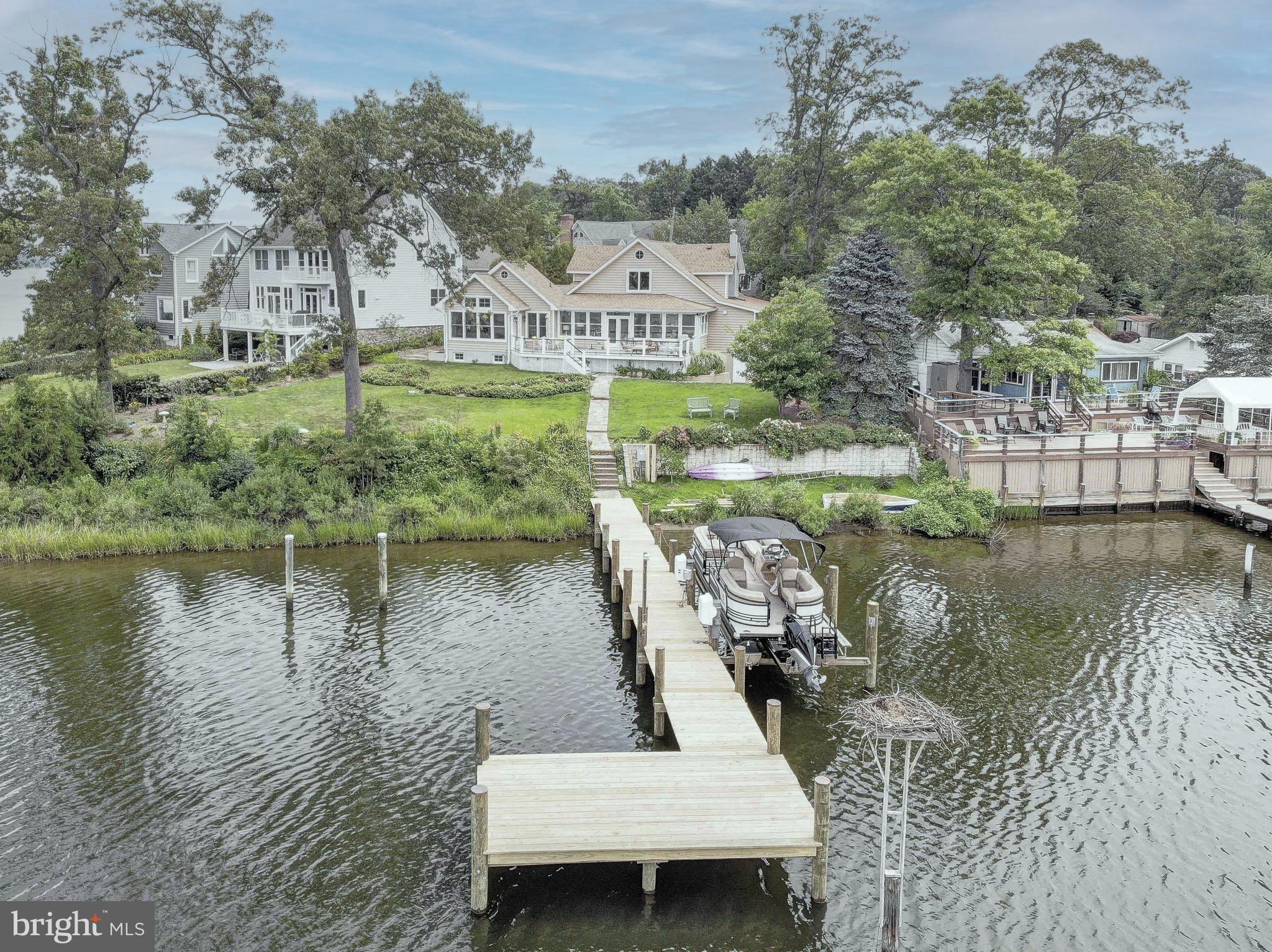 1404 Oak Bluff Road Edgewater, MD 21037 - Photo 2 of 47 Brand new 84' pier with 10'x20' deck
