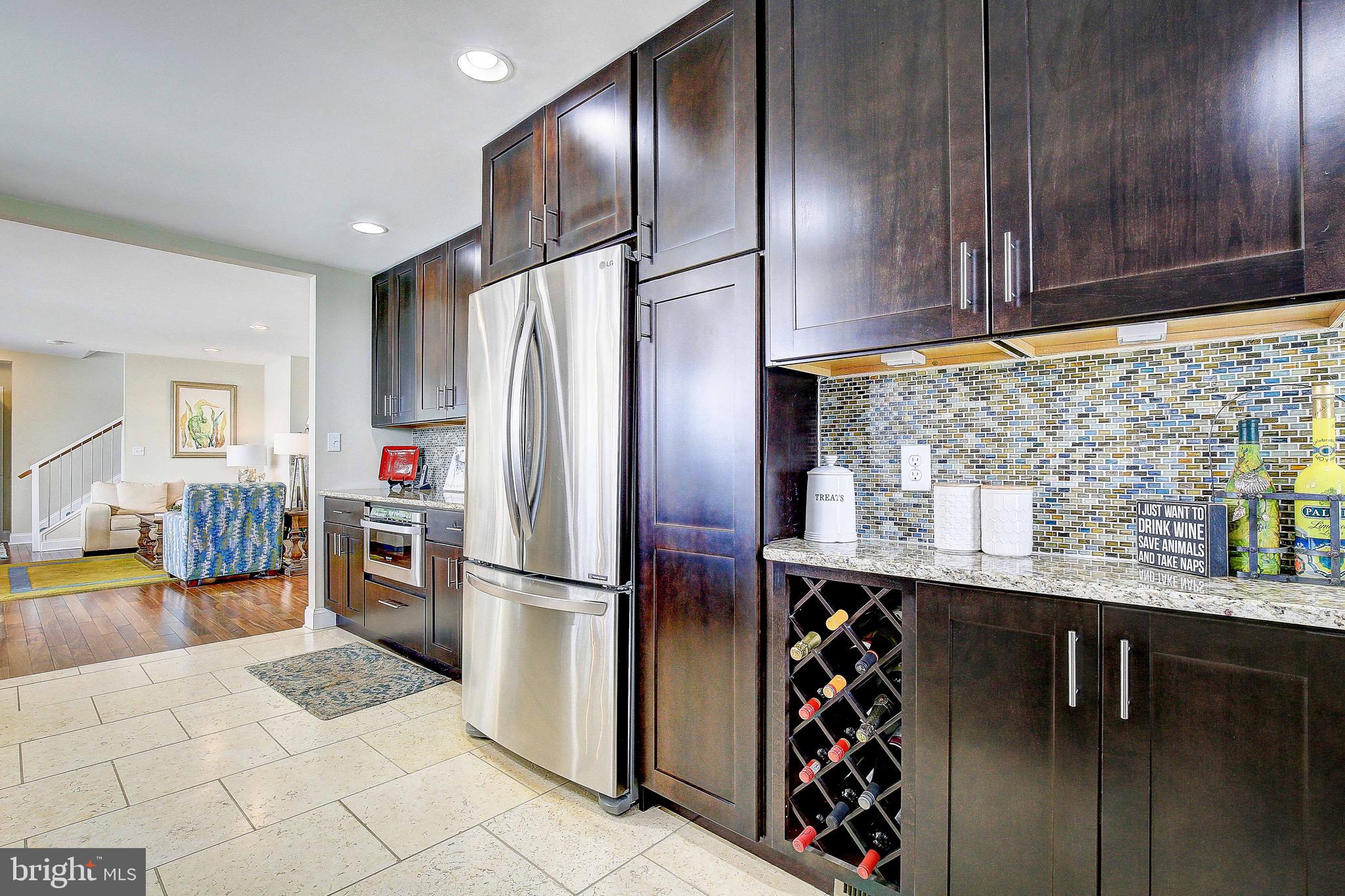 1404 Oak Bluff Road Edgewater, MD 21037 - Photo 23 of 47 Beautiful wood cabinets and stone flooring