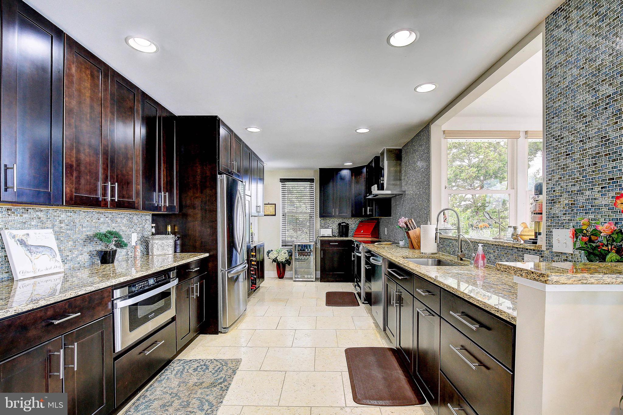 1404 Oak Bluff Road Edgewater, MD 21037 - Photo 4 of 47 Beautiful kitchen w/whole wall backsplash accent