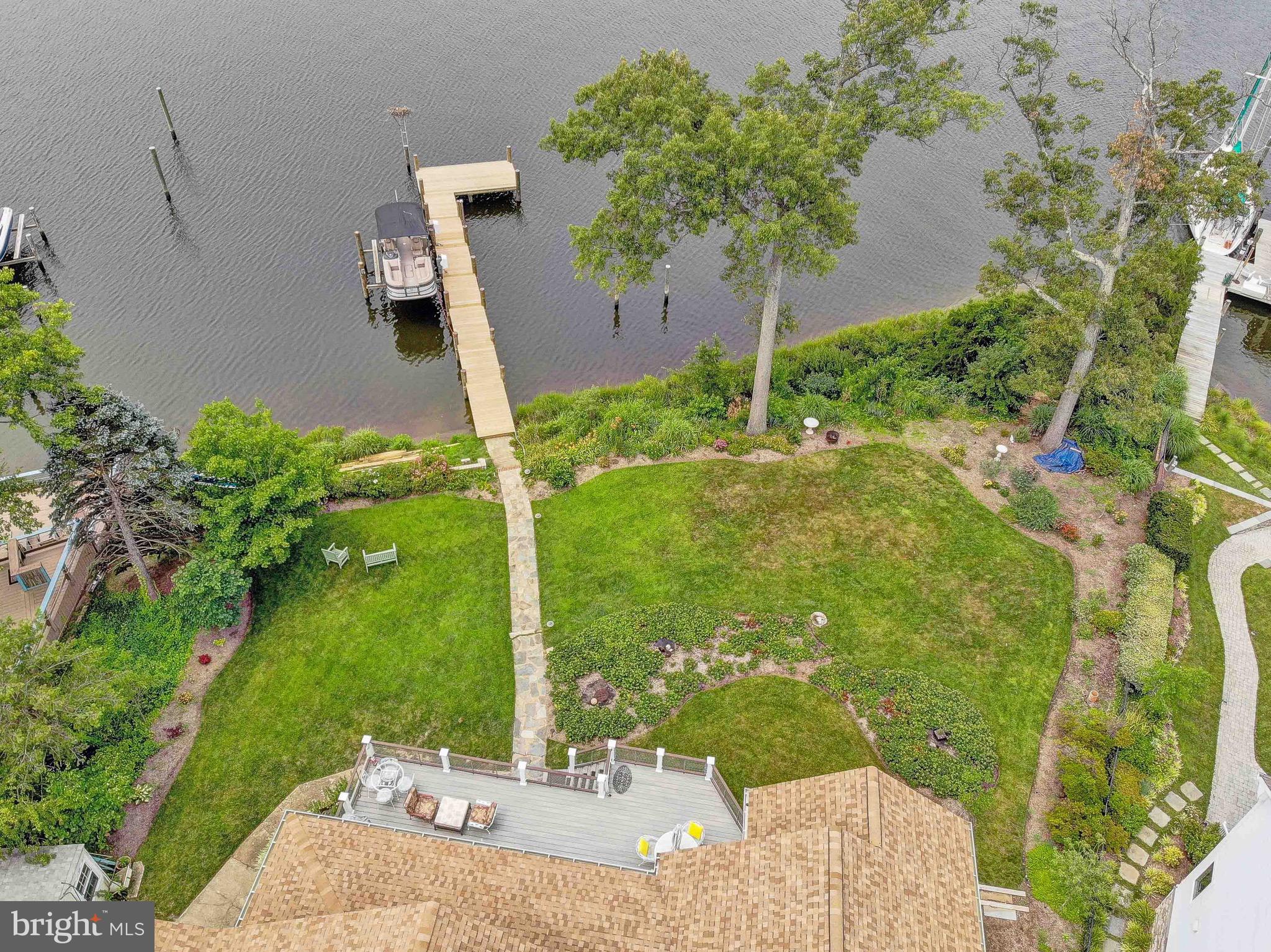 1404 Oak Bluff Road Edgewater, MD 21037 - Photo 42 of 47 Landscaped yard feat. indigenous plants & trees