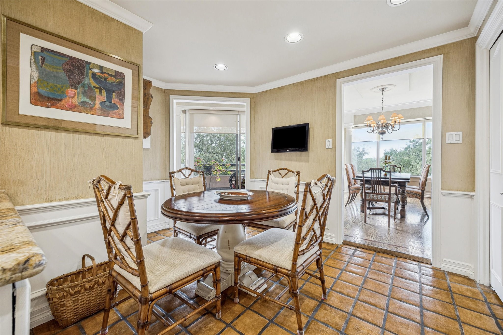 101 Westcott Street, Unit 202 Houston, TX 77007 - Photo 12 of 33 a view of a dining room with furniture and wooden floor