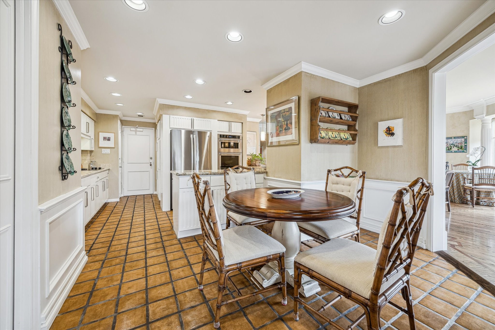 101 Westcott Street, Unit 202 Houston, TX 77007 - Photo 13 of 33 a view of a dining room with furniture and wooden floor