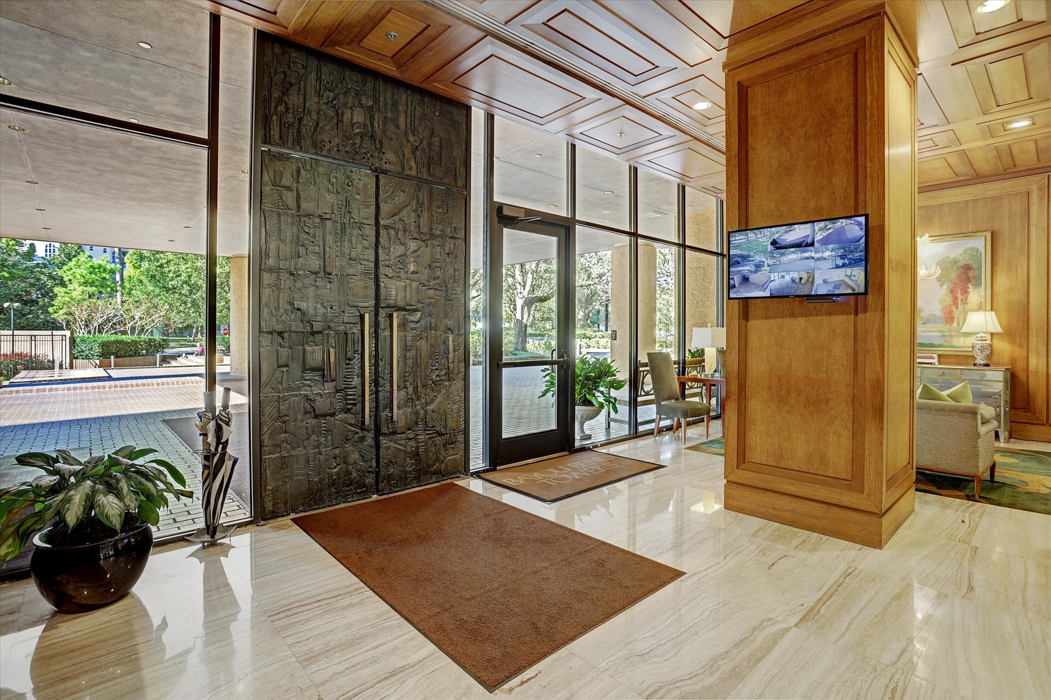 101 Westcott Street, Unit 202 Houston, TX 77007 - Photo 27 of 33 a view of a entryway door with wooden floor