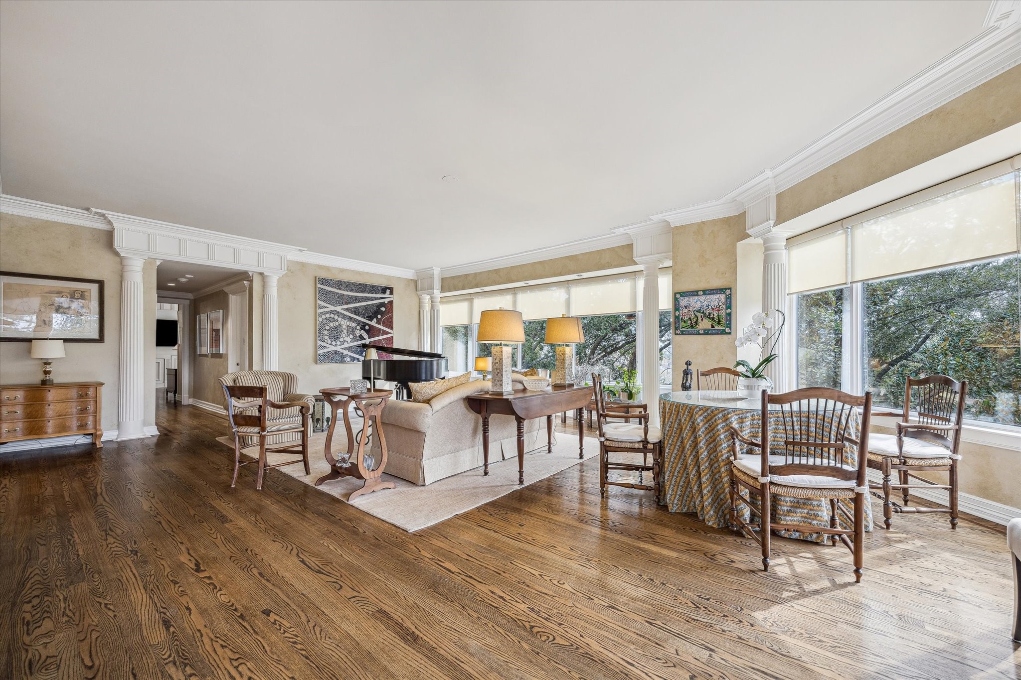 101 Westcott Street, Unit 202 Houston, TX 77007 - Photo 6 of 33 a living room with fireplace furniture and a wooden floor