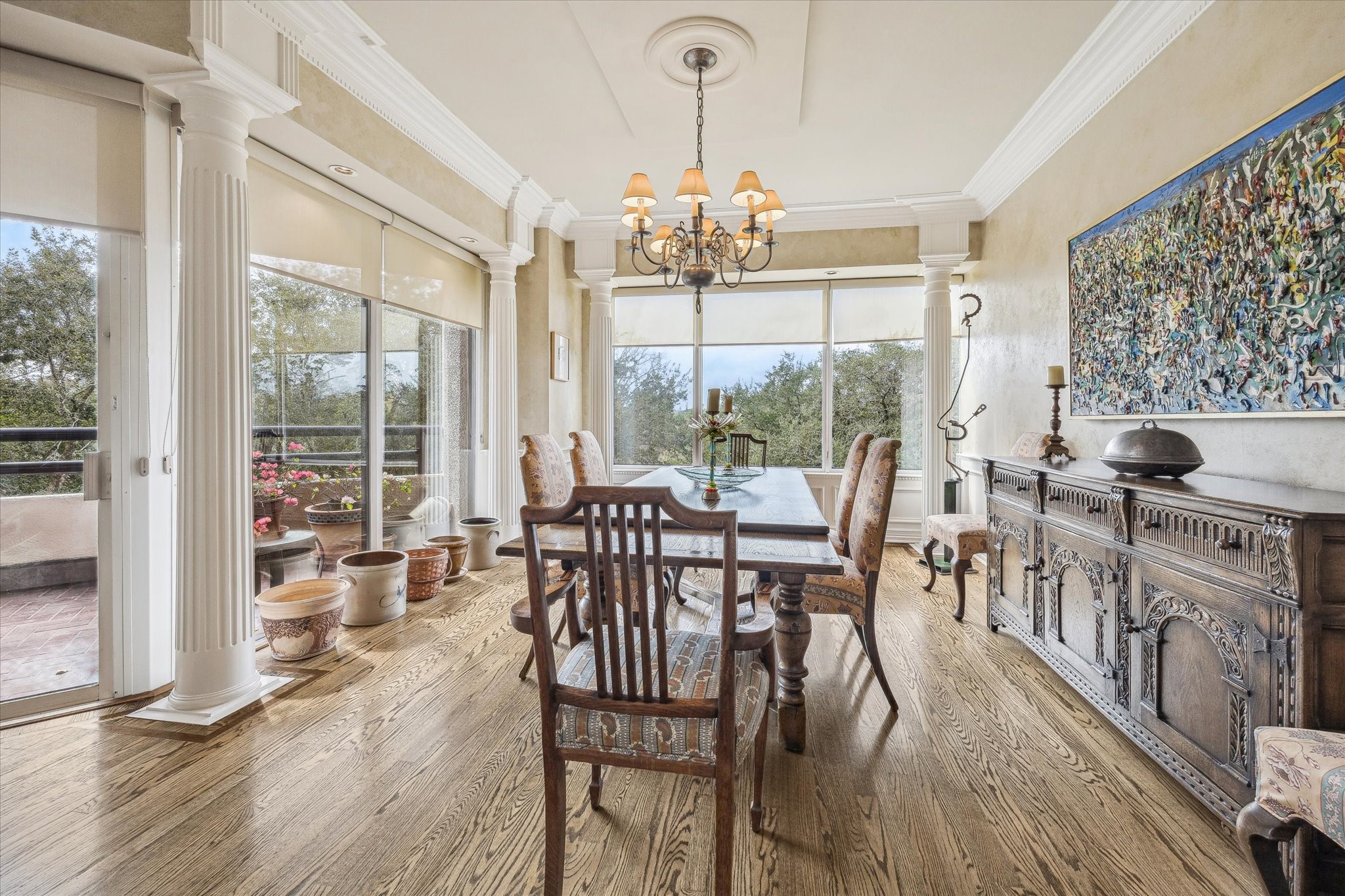 101 Westcott Street, Unit 202 Houston, TX 77007 - Photo 9 of 33 a view of a dining room with furniture window and wooden floor
