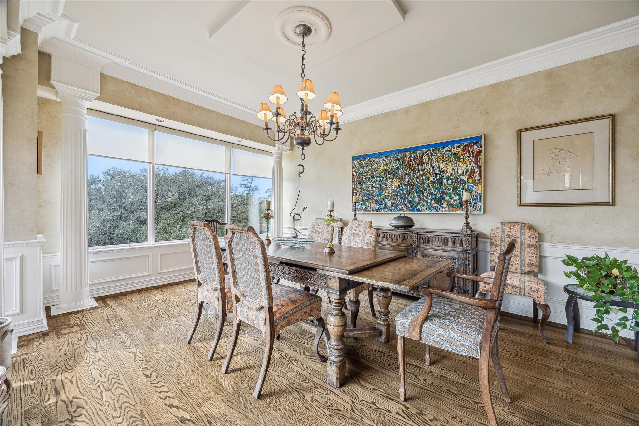 101 Westcott Street, Unit 202 Houston, TX 77007 - Photo 10 of 33 a view of a dining room with furniture window and wooden floor