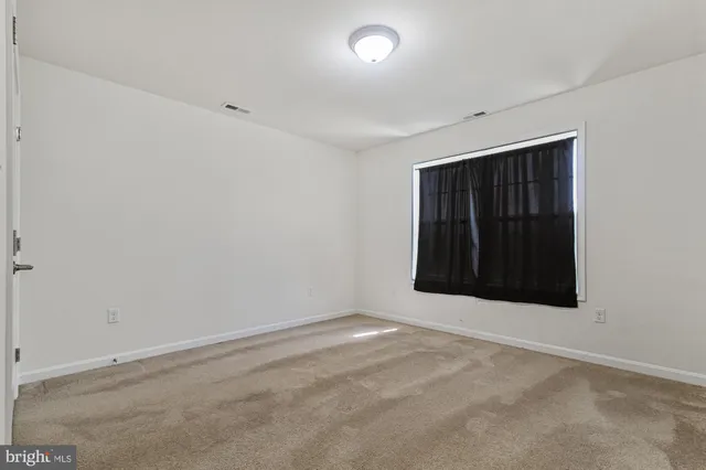 an empty room with an empty space