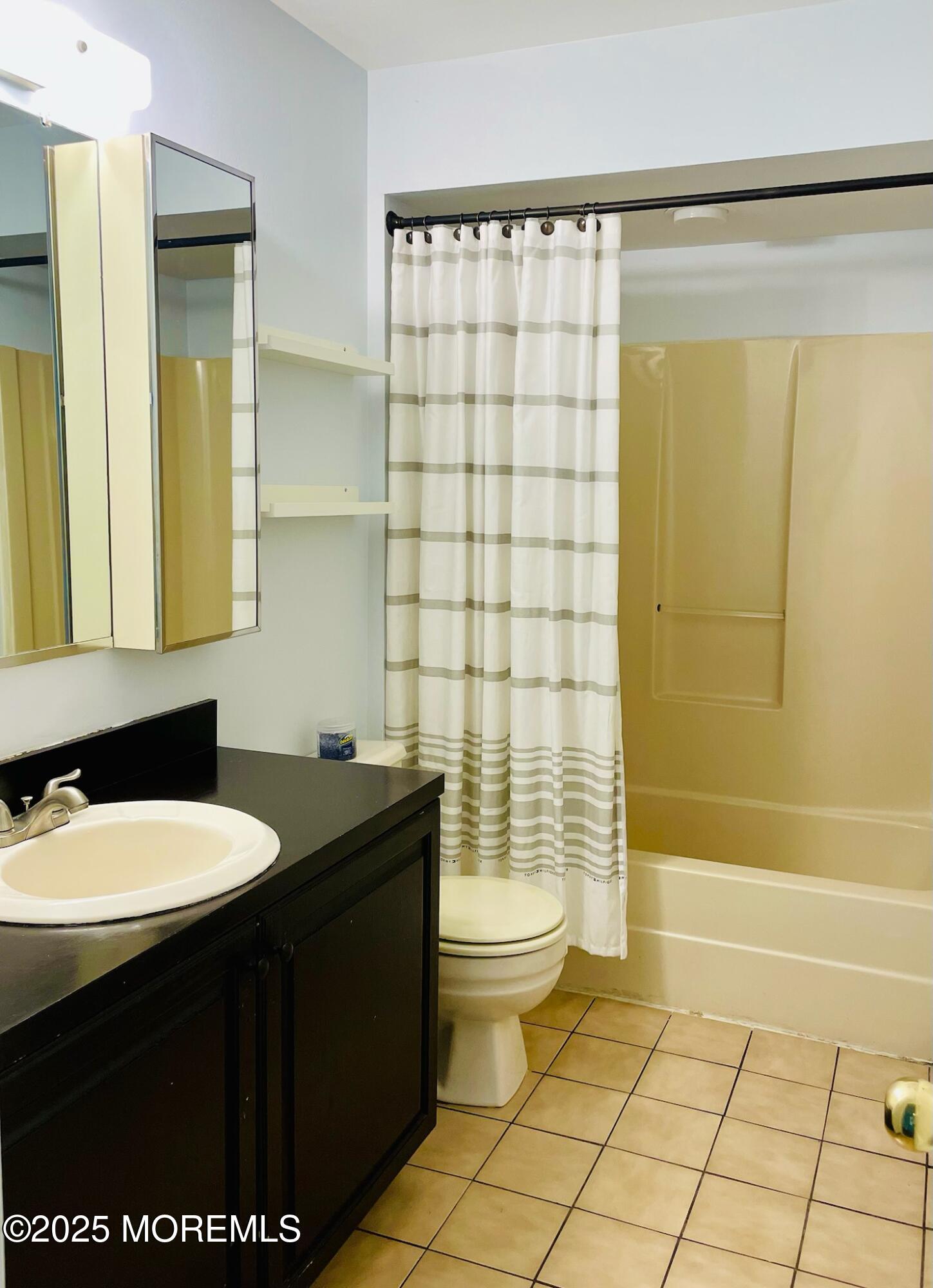 190 Spruce Street, Unit 8 Long Branch, NJ 07740 - Photo 13 of 15 a bathroom with a sink a toilet and shower