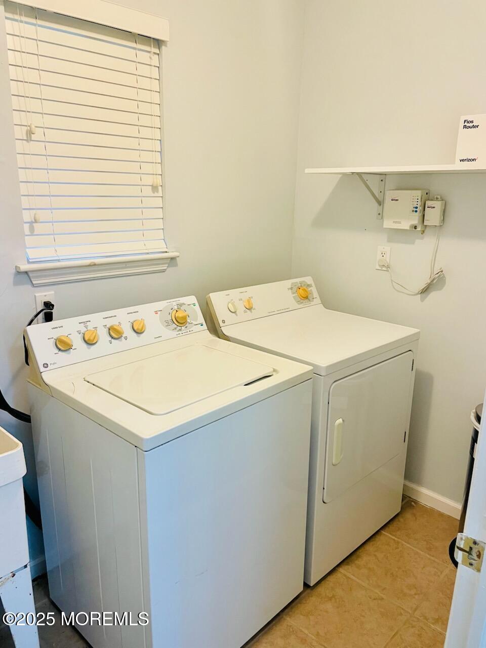 190 Spruce Street, Unit 8 Long Branch, NJ 07740 - Photo 15 of 15 a utility room with dryer and washer