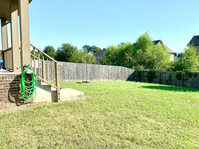 a view of a garden with a slide
