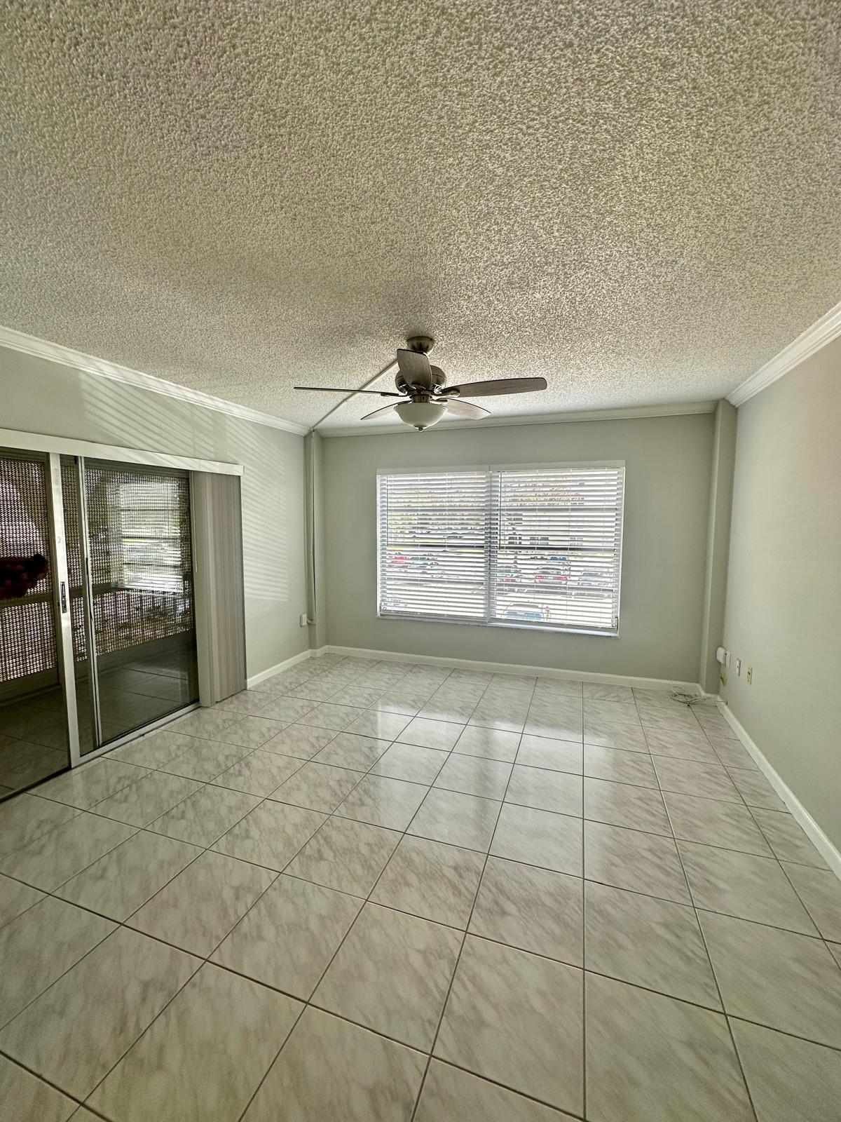 4158 Inverrary Drive, Unit 202 Lauderhill, FL 33319 - Photo 11 of 20 a view of an empty room and window