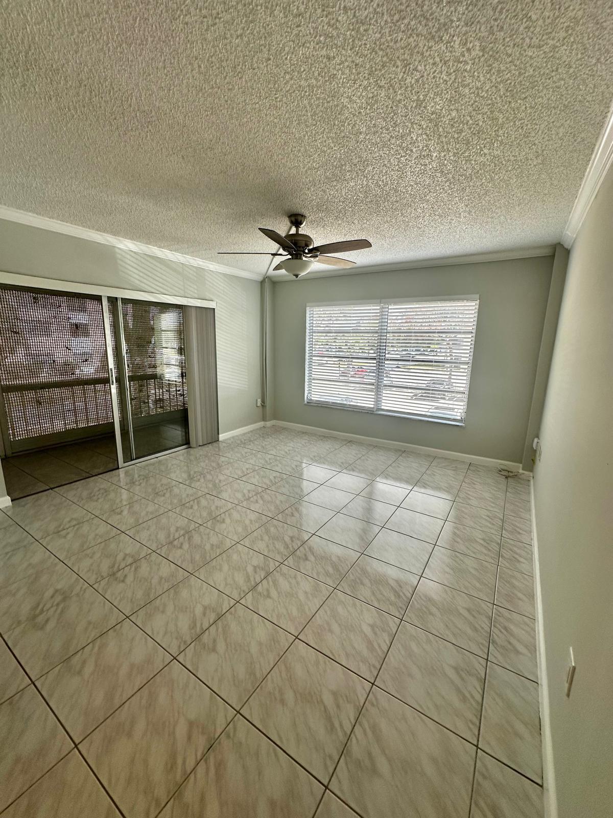 4158 Inverrary Drive, Unit 202 Lauderhill, FL 33319 - Photo 13 of 20 a view of an empty room with a window