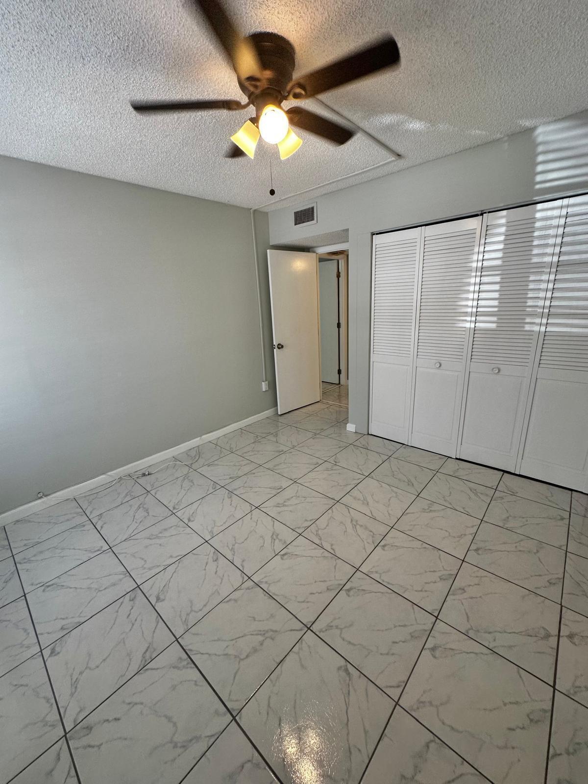 4158 Inverrary Drive, Unit 202 Lauderhill, FL 33319 - Photo 18 of 20 a view of a livingroom with closet