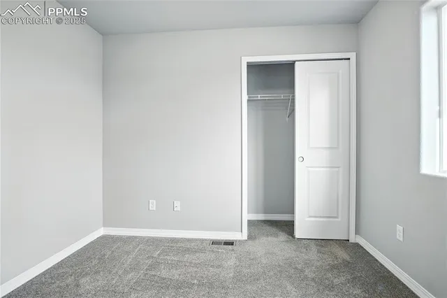 an empty room with closet