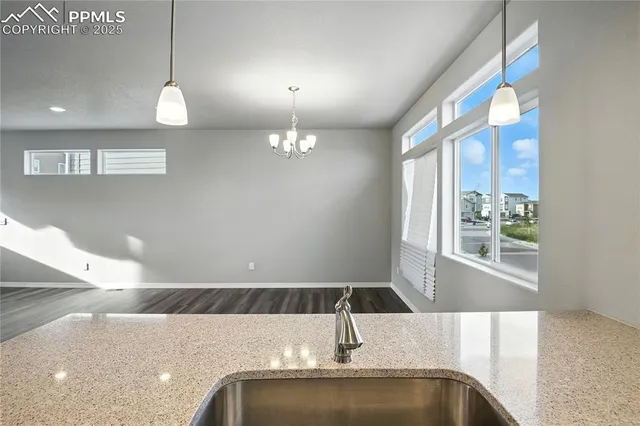a view of a livingroom with furniture