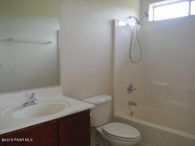4605 North Miller Road Rimrock, AZ 86335 - Photo 10 of 20 a bathroom with a sink toilet and shower
