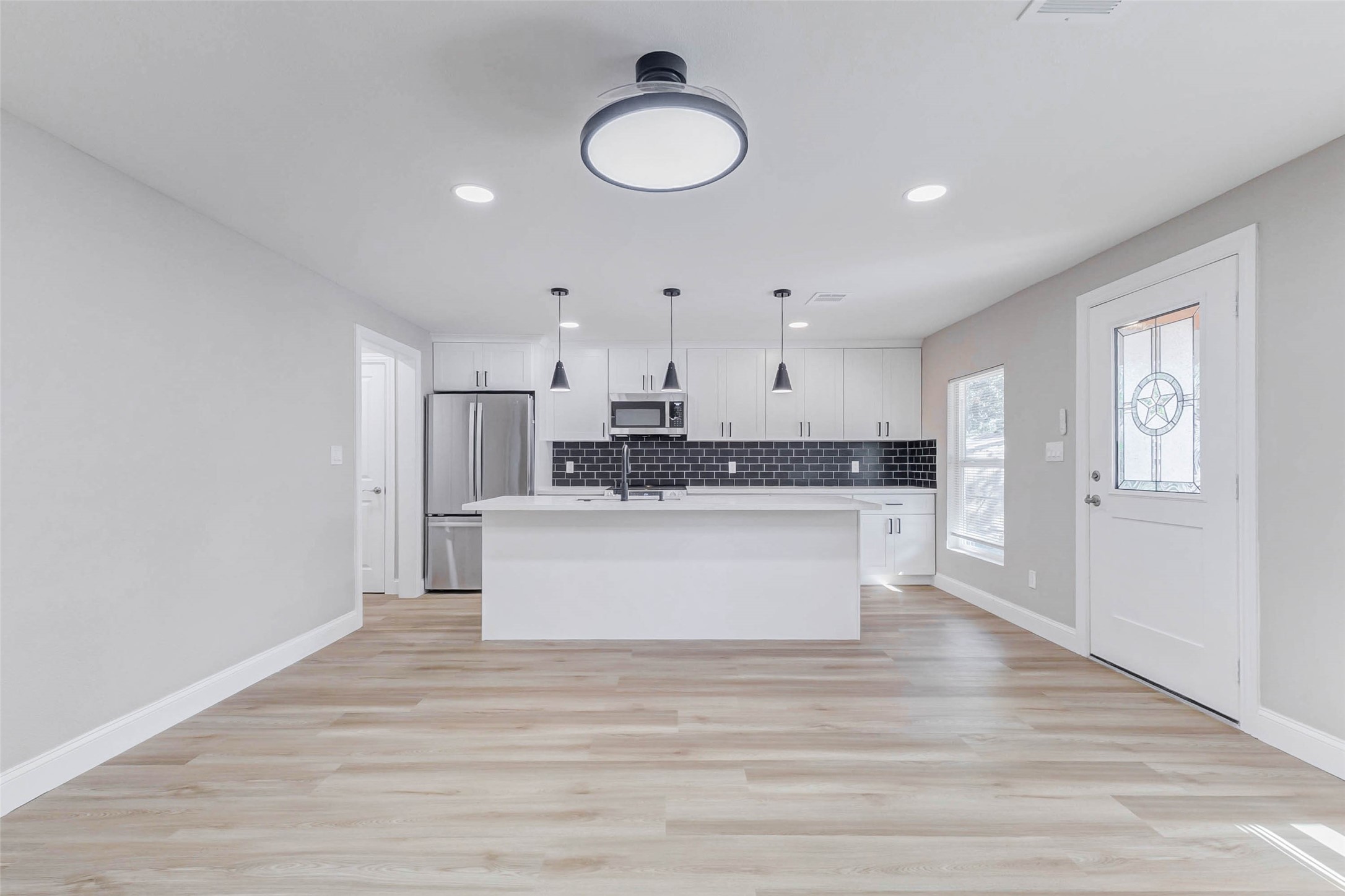 1054 Dewalt Street Houston, TX 77088 - Photo 14 of 24 a view of kitchen with wooden floor