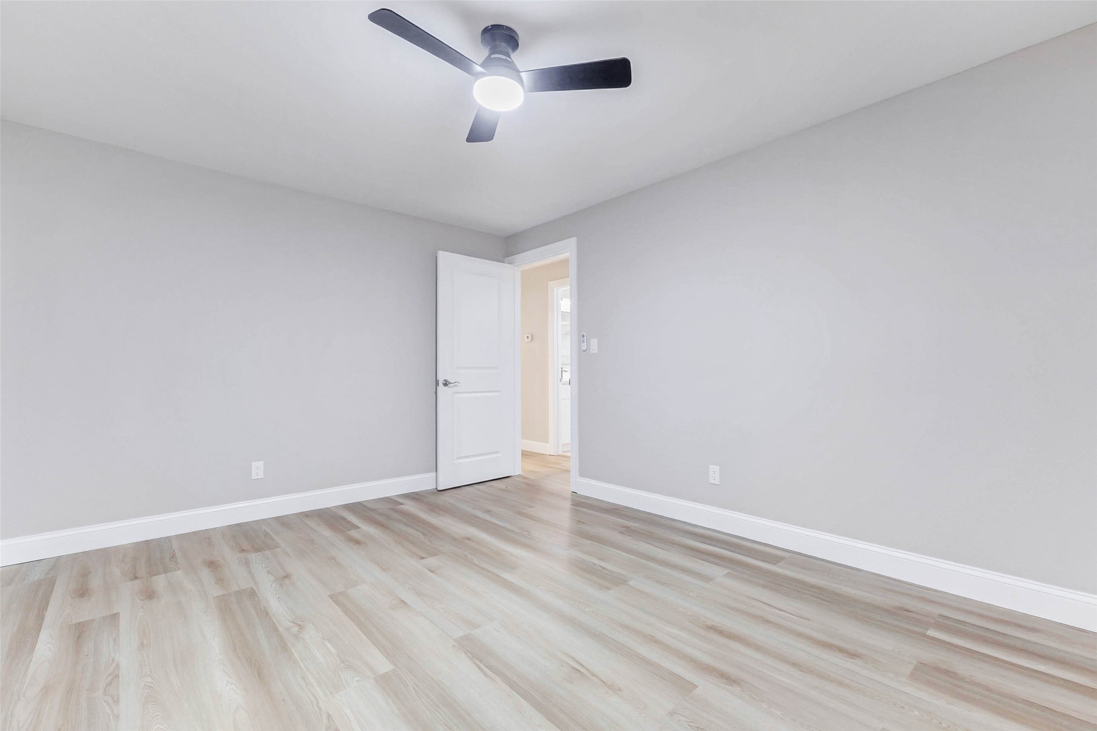 1054 Dewalt Street Houston, TX 77088 - Photo 22 of 24 wooden floor in an empty room