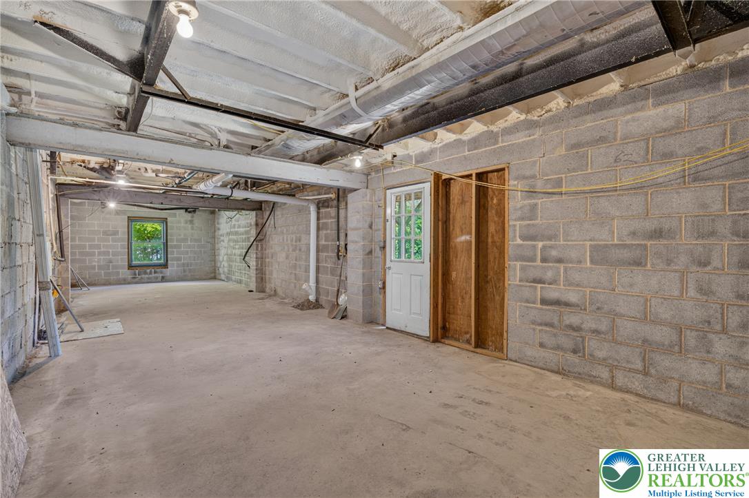 2674 Williams Road Danielsville, PA 18038 - Photo 12 of 31 A spacious, unfinished basement offers endless possibilities for customization and future expansion.