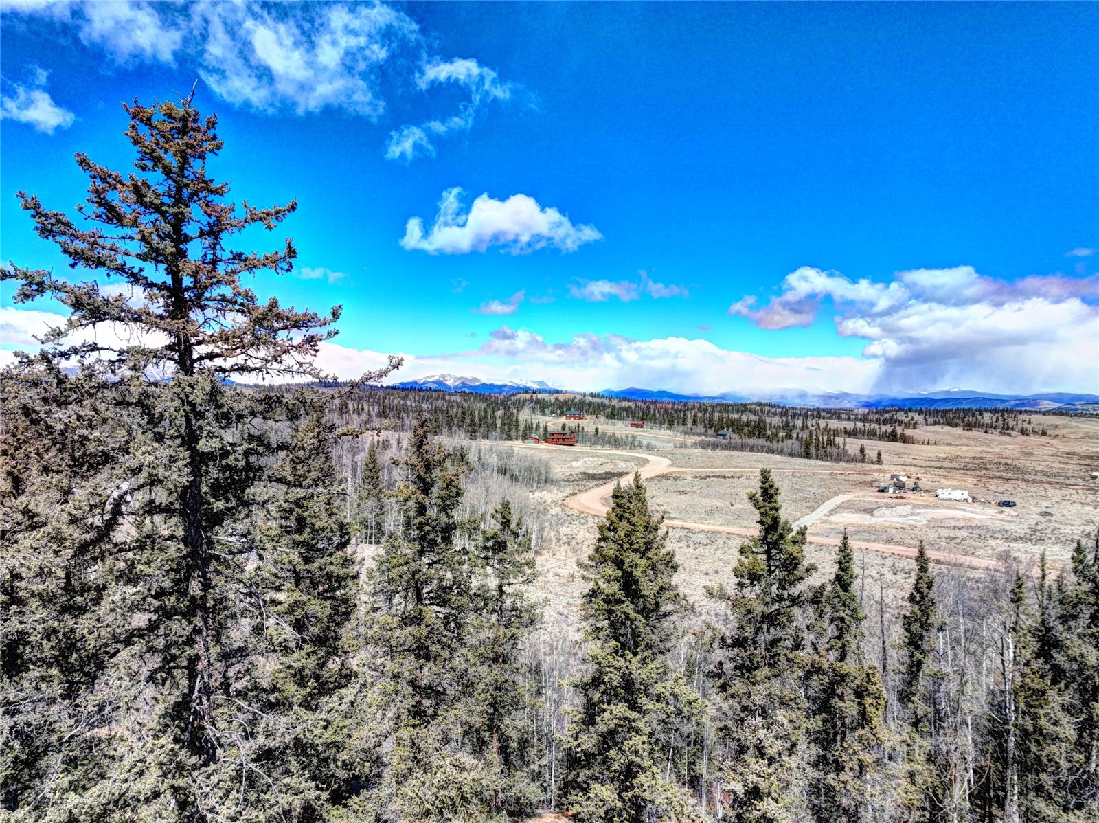1059 Piaute Way Como, CO 80432 - Photo 9 of 34 a view of a lake with a building in the background