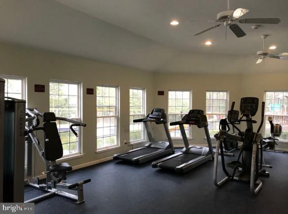 735 Runabout Loop, Unit 735 Solomons, MD 20688 - Photo 46 of 51 a room with gym equipment and large mirror