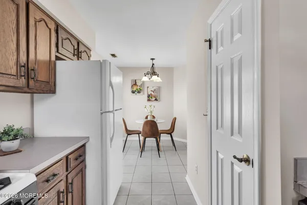 a view of a livingroom with furniture and entryway