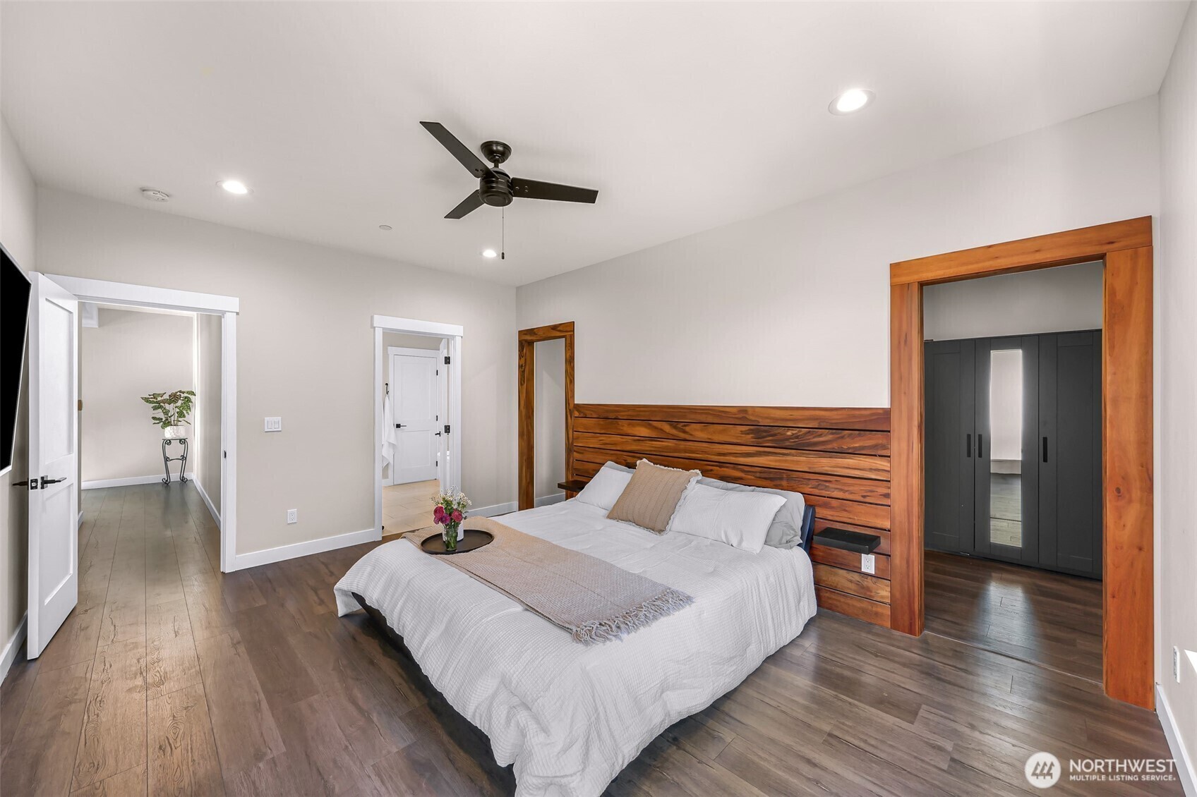 322 Manley Road Bellingham, WA 98229 - Photo 14 of 40 a bedroom with a bed and wooden floor