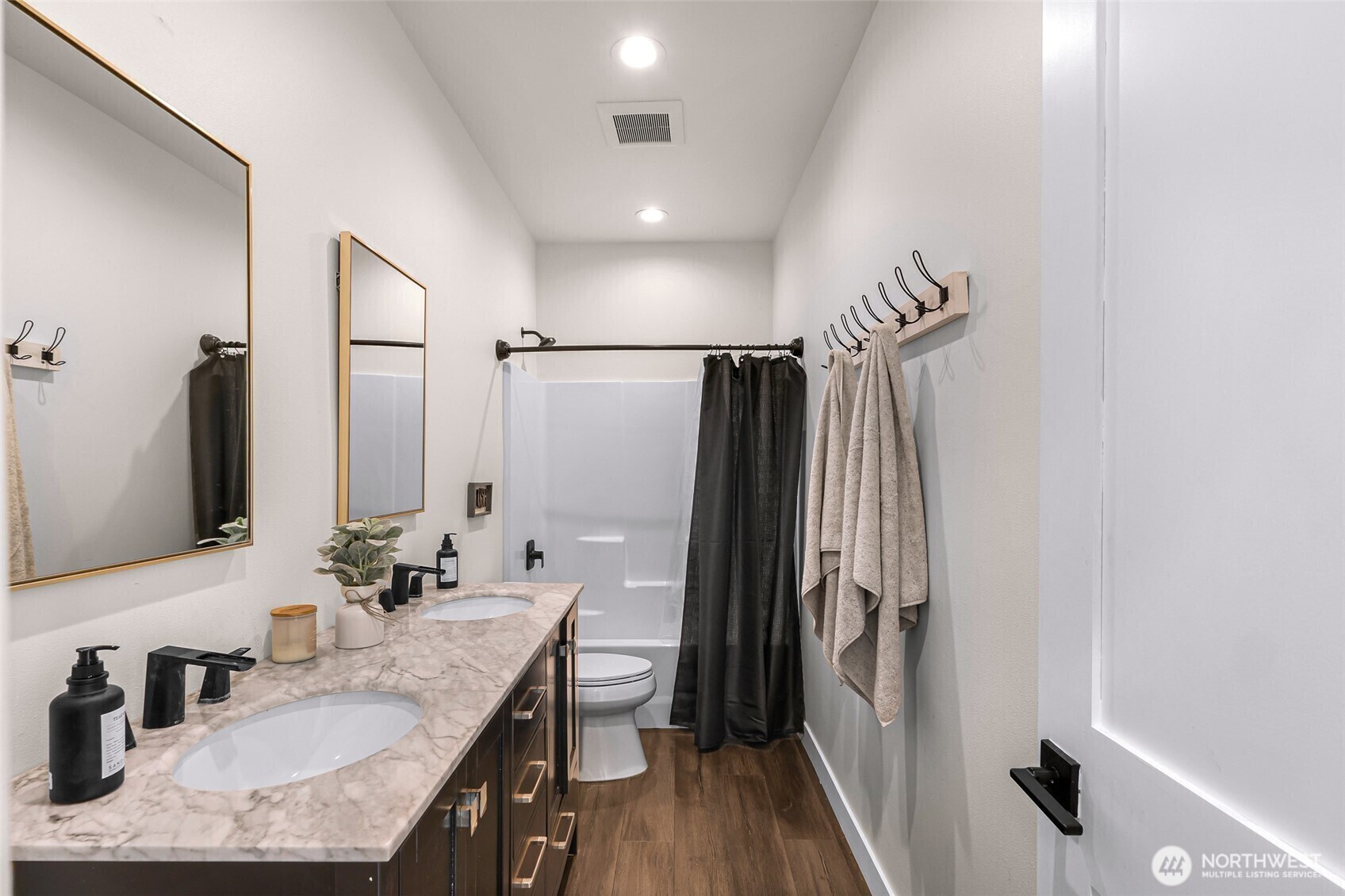 322 Manley Road Bellingham, WA 98229 - Photo 25 of 40 a bathroom with double vanity sink and a mirror