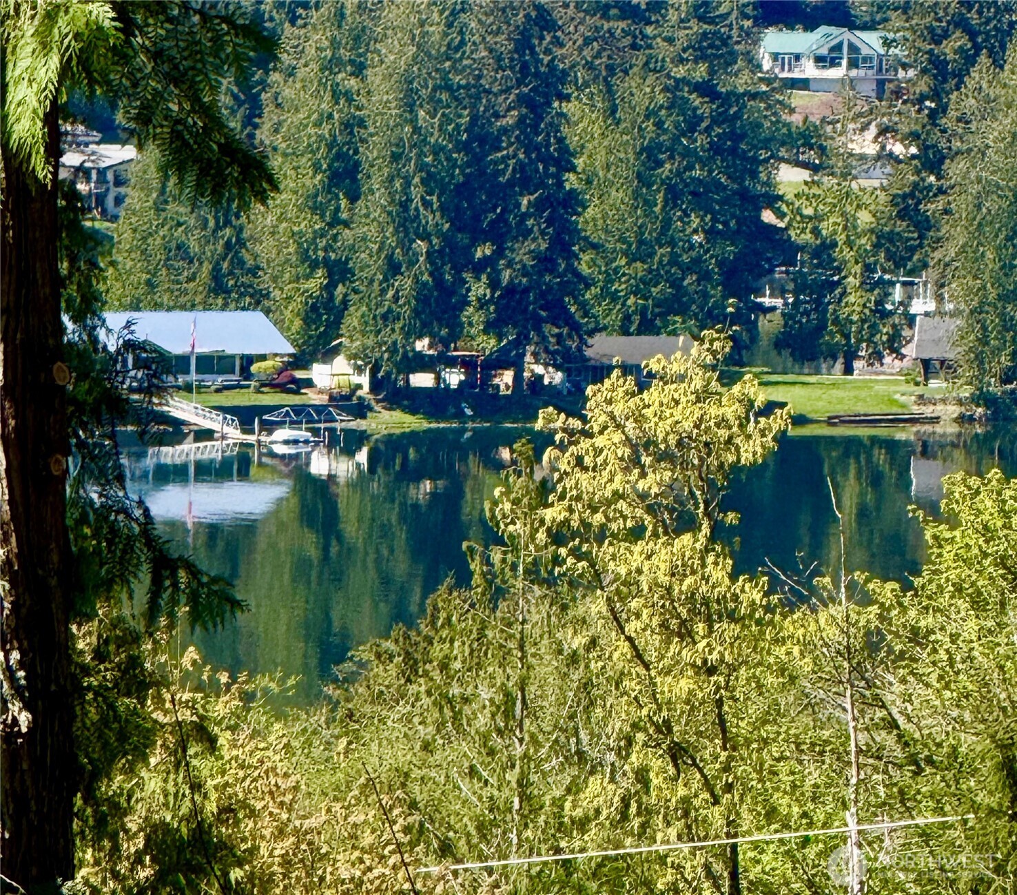 322 Manley Road Bellingham, WA 98229 - Photo 6 of 40 a backyard of a house with a yard and outdoor seating